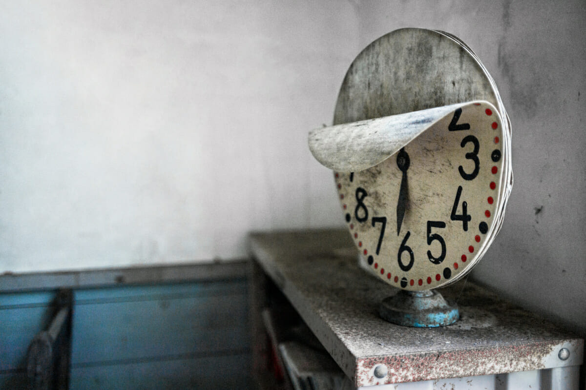 clock in an abandoned school