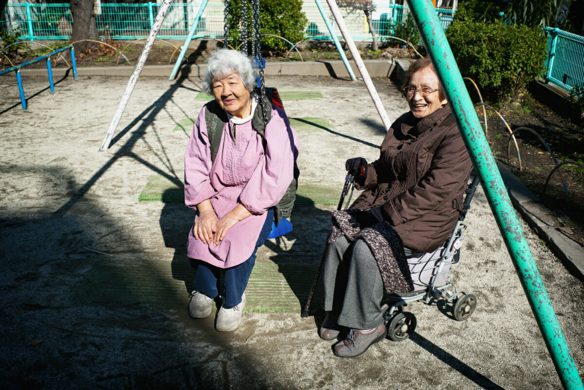 elderly Japanese women in a children's playground in Tokyo