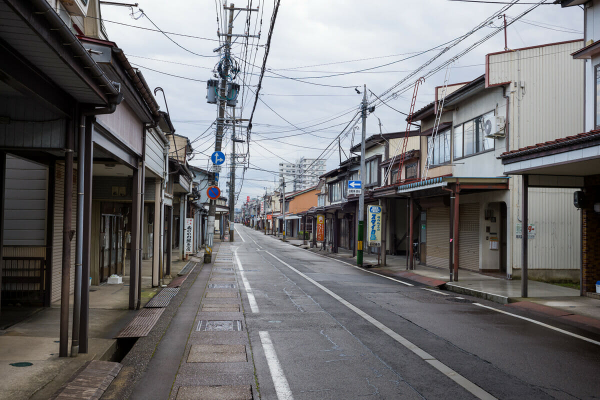 The faded traditional shop fronts of an old Japanese town
