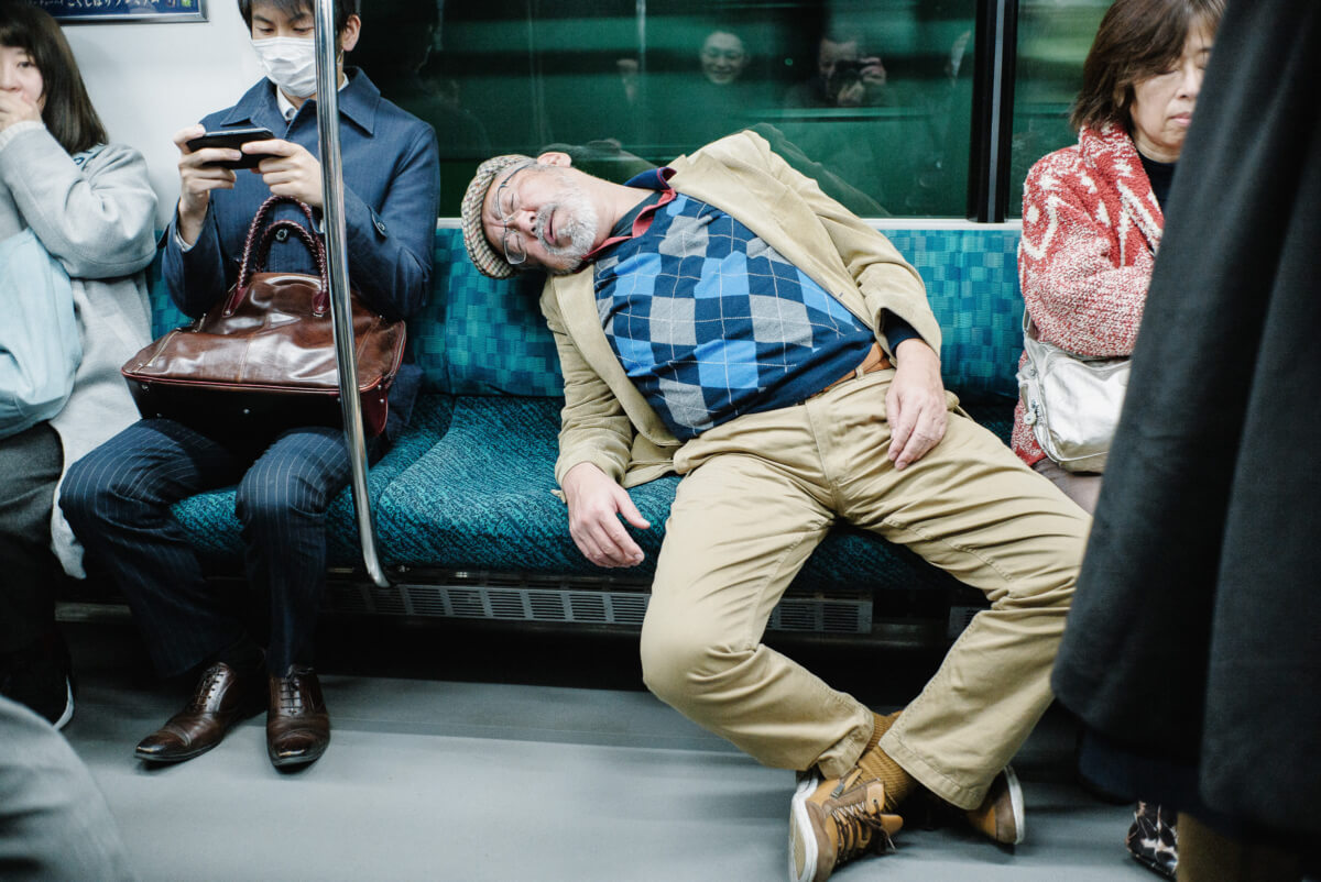 drunk man on a Tokyo train