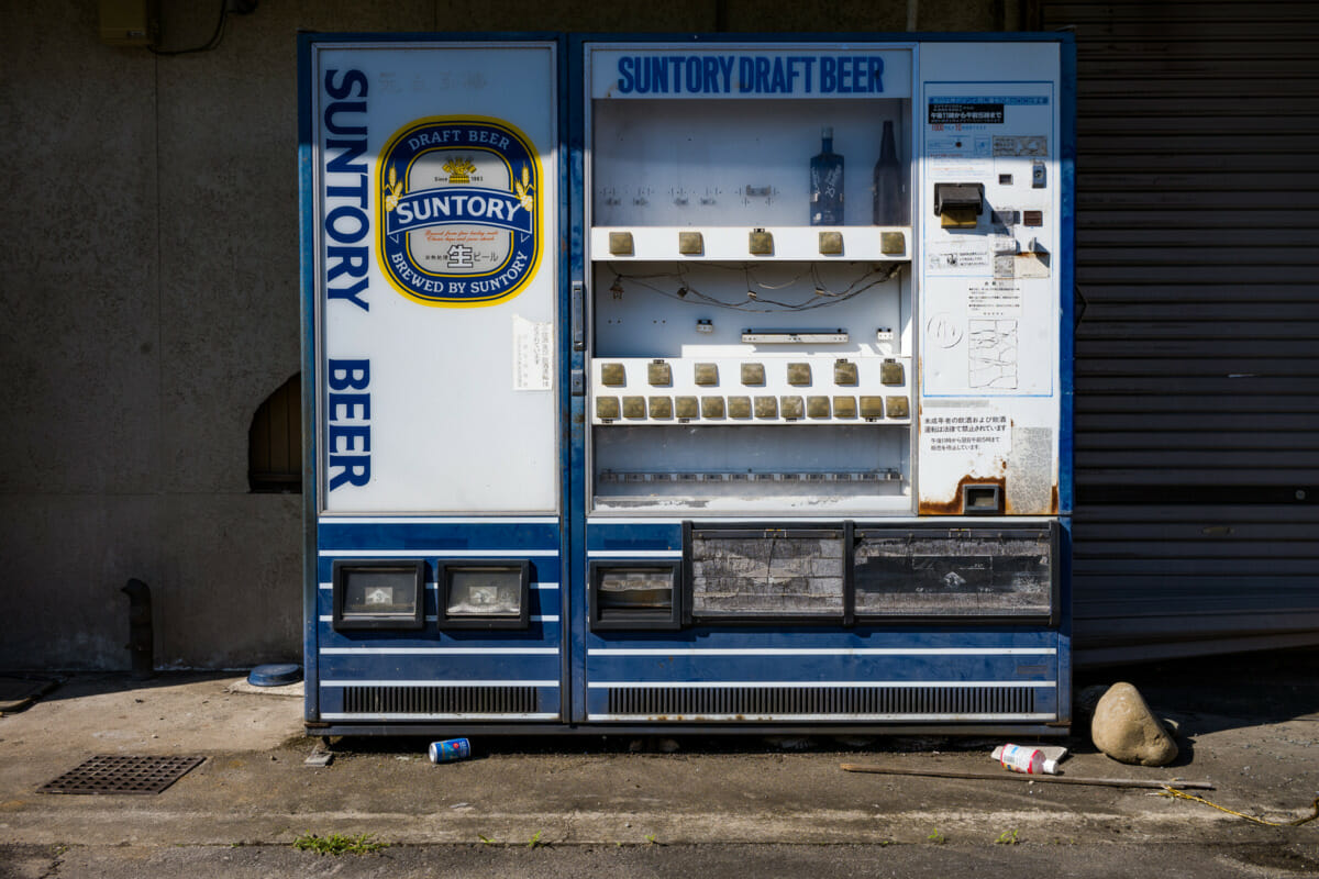 old and broken Japanese vending machines