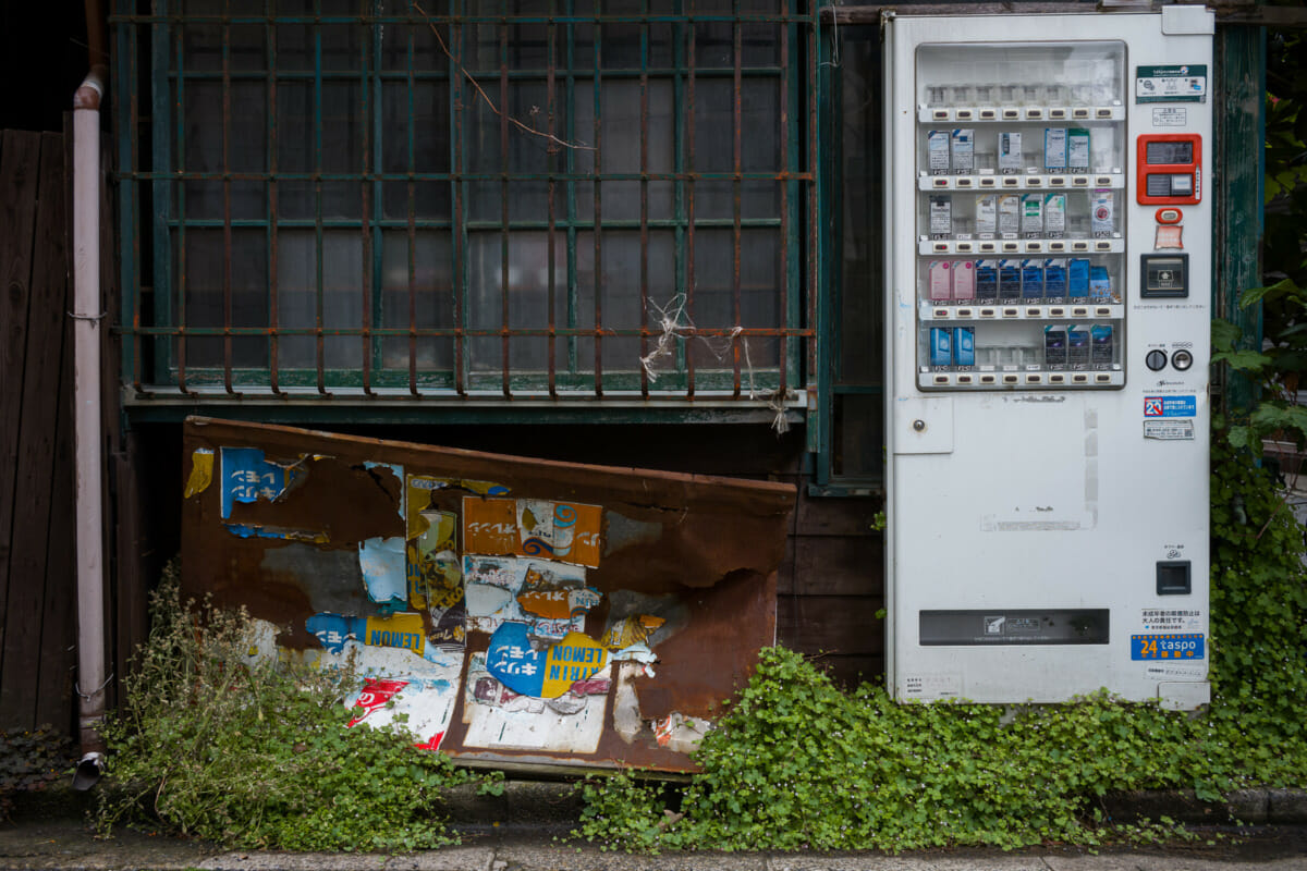 old and broken Japanese vending machines