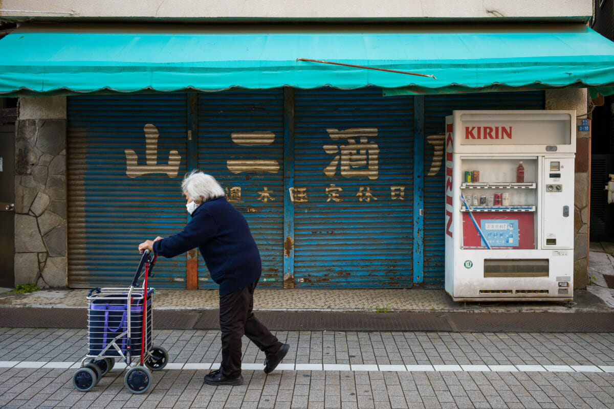 An old and shuttered up Tokyo liquor store