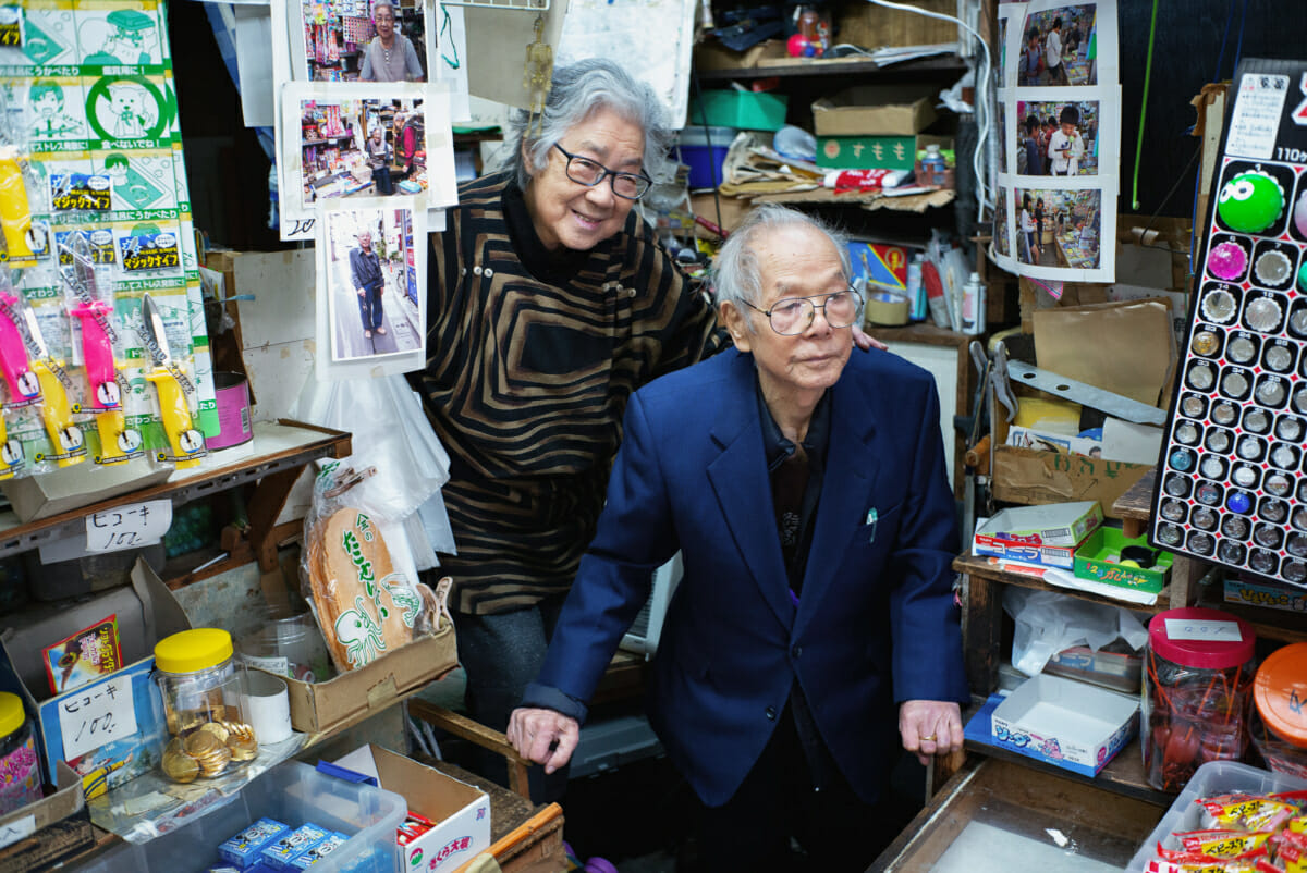 An old Japanese couple in their tiny old Tokyo shop
