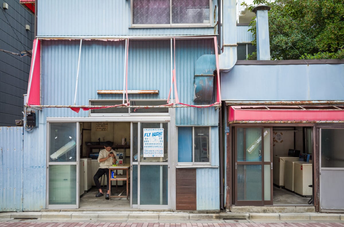 An old Tokyo laundrette, colours and lots of Coca-Cola