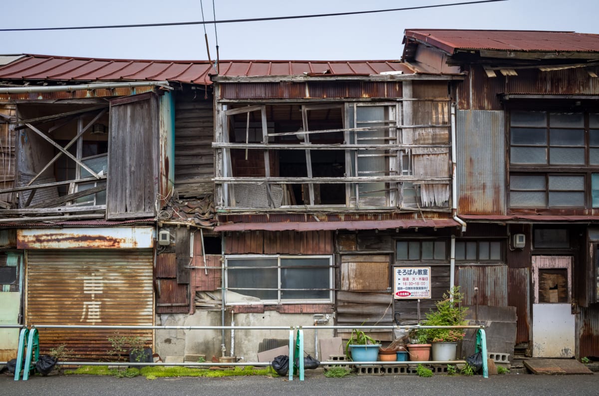 dilapidated pre-war and wooden Japanese shopping street