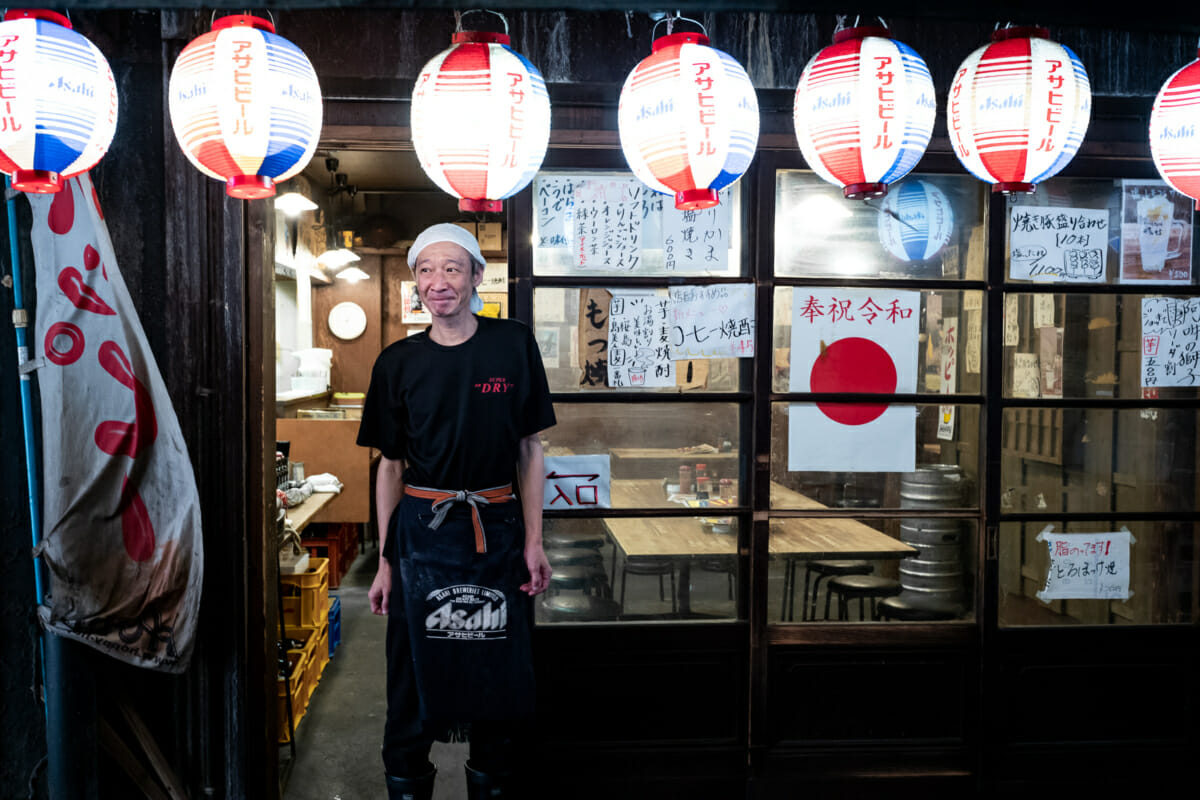 an old and retro tokyo bar and its owner
