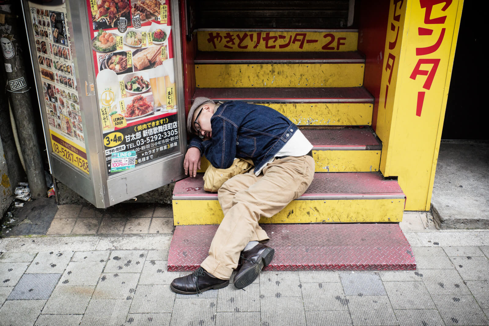 drunk-and-asleep-amidst-some-urban-autumn-colours-tokyo-times